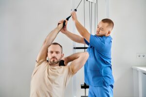 strength training with his doctor in a rehabilitation session for recovery.